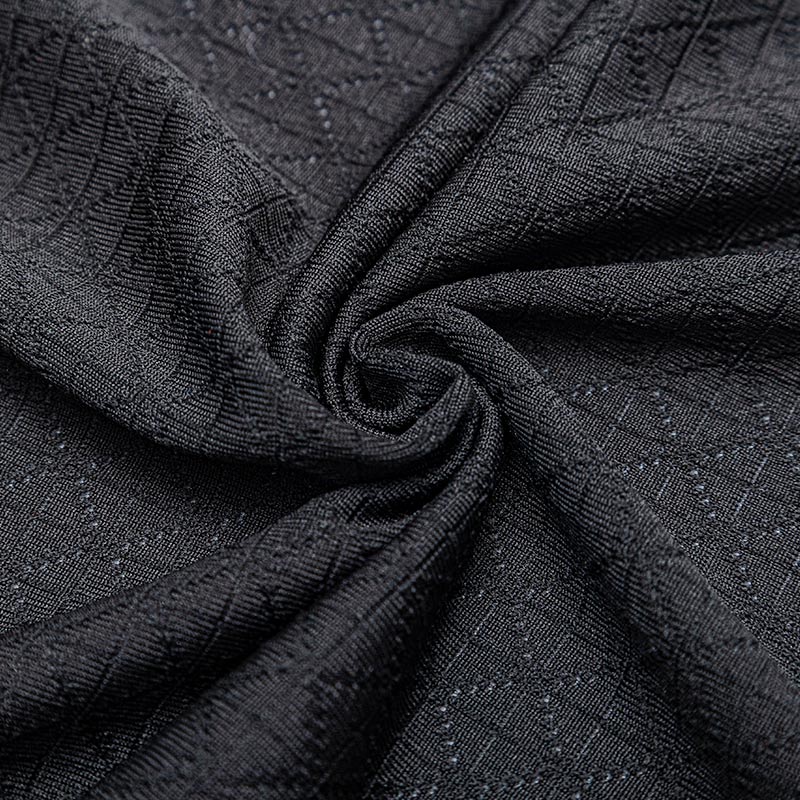 Tejido 100% poliéster jacquard.